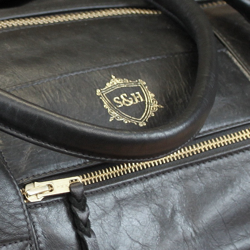 Black Leather Duffle - Swagger & Hide | Our leather luggage accessories and leather travel bags make the perfect gift for him!  All of our products are handcrafted and personalised.